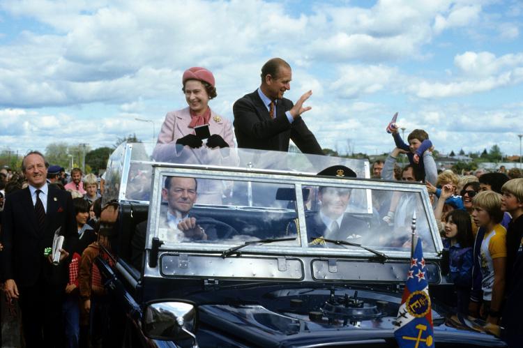 WELLINGTON NEW ZEALAND - OCTOBER 1:  Queen Elizabeth ll and Prince Philip, Duke of Edinburgh wave to wellwishers from their open car in October 1981 in Wellington, New Zealand. (Photo by Anwar Hussein/Getty Images)  - Anwar Hussein/Getty Images - Anwar Hussein/Getty Images