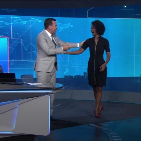 Rodrigo Bocardi "cede" previsão do tempo para Maria Júlia Coutinho no "Jornal Nacional" - Reprodução/TV Globo - Reprodução/TV Globo