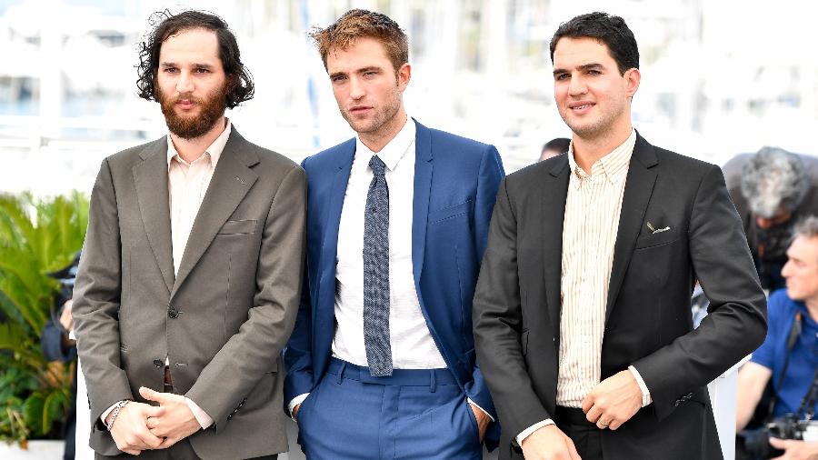 Os diretores Josh Safdie, Benny Safdie com o ator Robert Pattinson em Cannes, na França - Chen Yichen/Xinhua