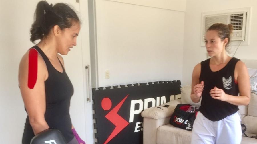 A lutadora Érica Paes treinando a atriz Paolla Oliveira, para a novela "A Força do Querer" - Arquivo Pessoal