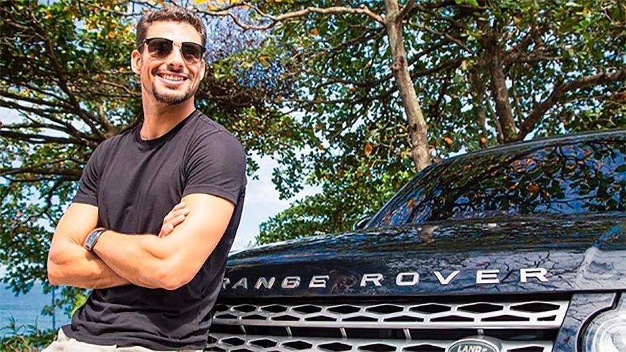 Para anunciar parceria, Cauã Reymond publicou uma foto ao lado de um Range Rover Sport no Instagram - Reprodução/Instagram