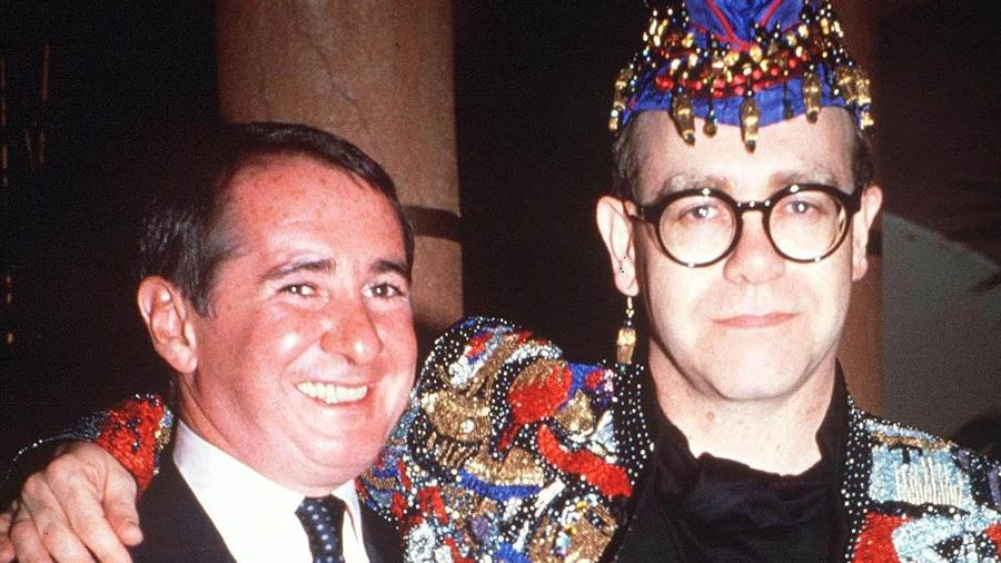 John Reid e Elton John em 1990; empresário foi determinante na construção da persona artística do cantor - Richard Young/Rex/Shutterstock