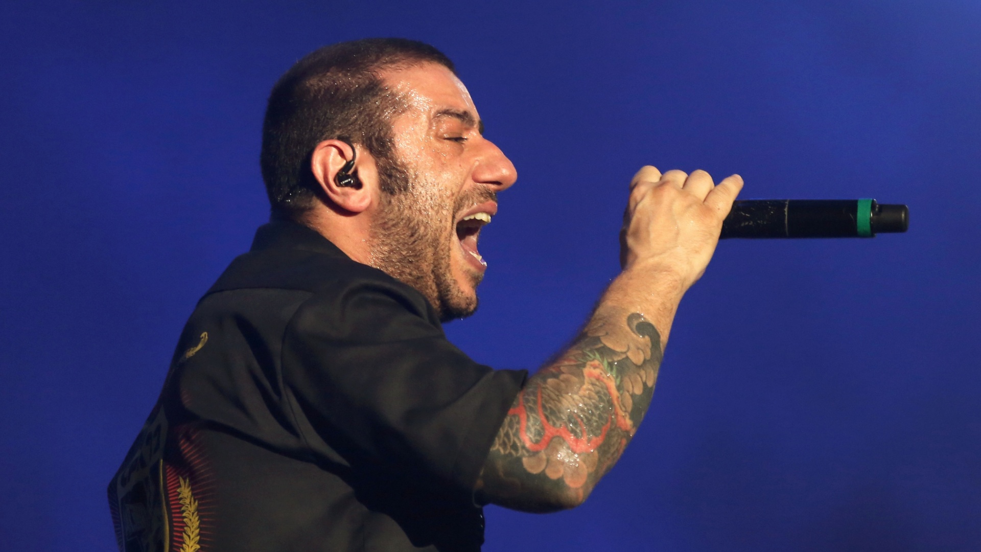 24.set.2015 - O CPM 22 abre os shows no palco mundo no quarto dia do Rock in Rio 2015, trazendo sucessos como "Dias Atrás" e "Um Minuto Para o Fim do Mundo" - Fernando Maia/UOL