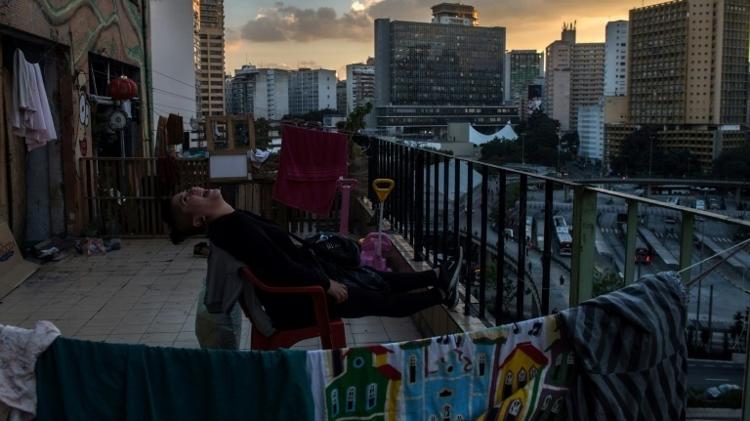 Moradora de prédio ocupado em São Paulo -  NELSON ALMEIDA/AFP -  NELSON ALMEIDA/AFP