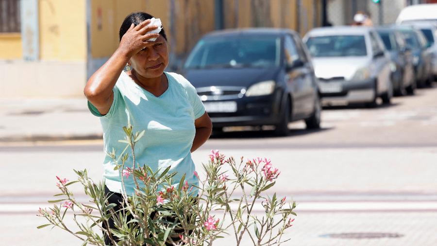 As alterações climáticas estão aumentando a frequência e a intensidade das ondas de calor - Eva Manez/Reuters