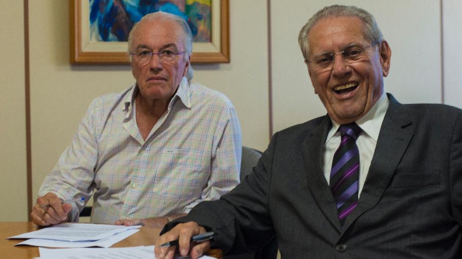 Luiz Fernando Neves e Joseval Peixoto no momento da assinatura do contrato, que permitirá a volta do "Desafio ao Galo". - TV Gazeta