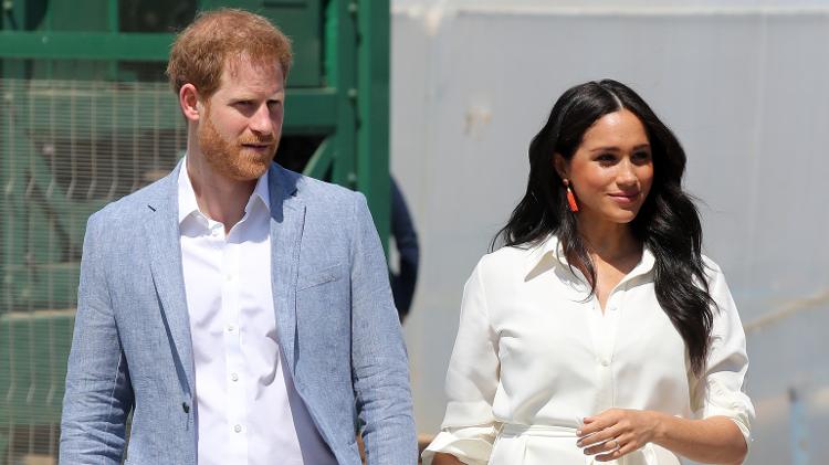 Meghan e Harry de mãos dadas - Getty Images - Getty Images