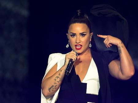Demi Lovato durante seu show no Rock in Rio Lisboa, em junho - Miguel Riopa/AFP