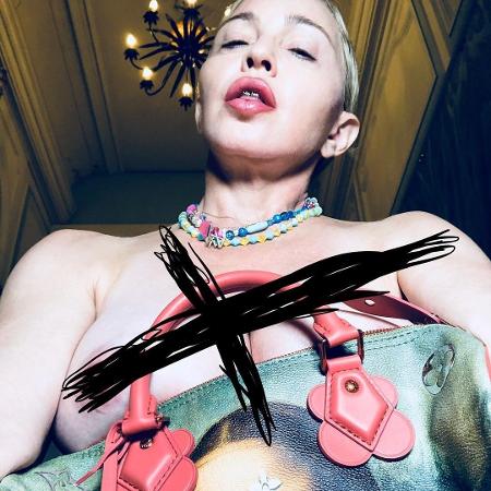 Madonna posa de topless com bolsa de R$ 16 mil - Reprodução/Instagram
