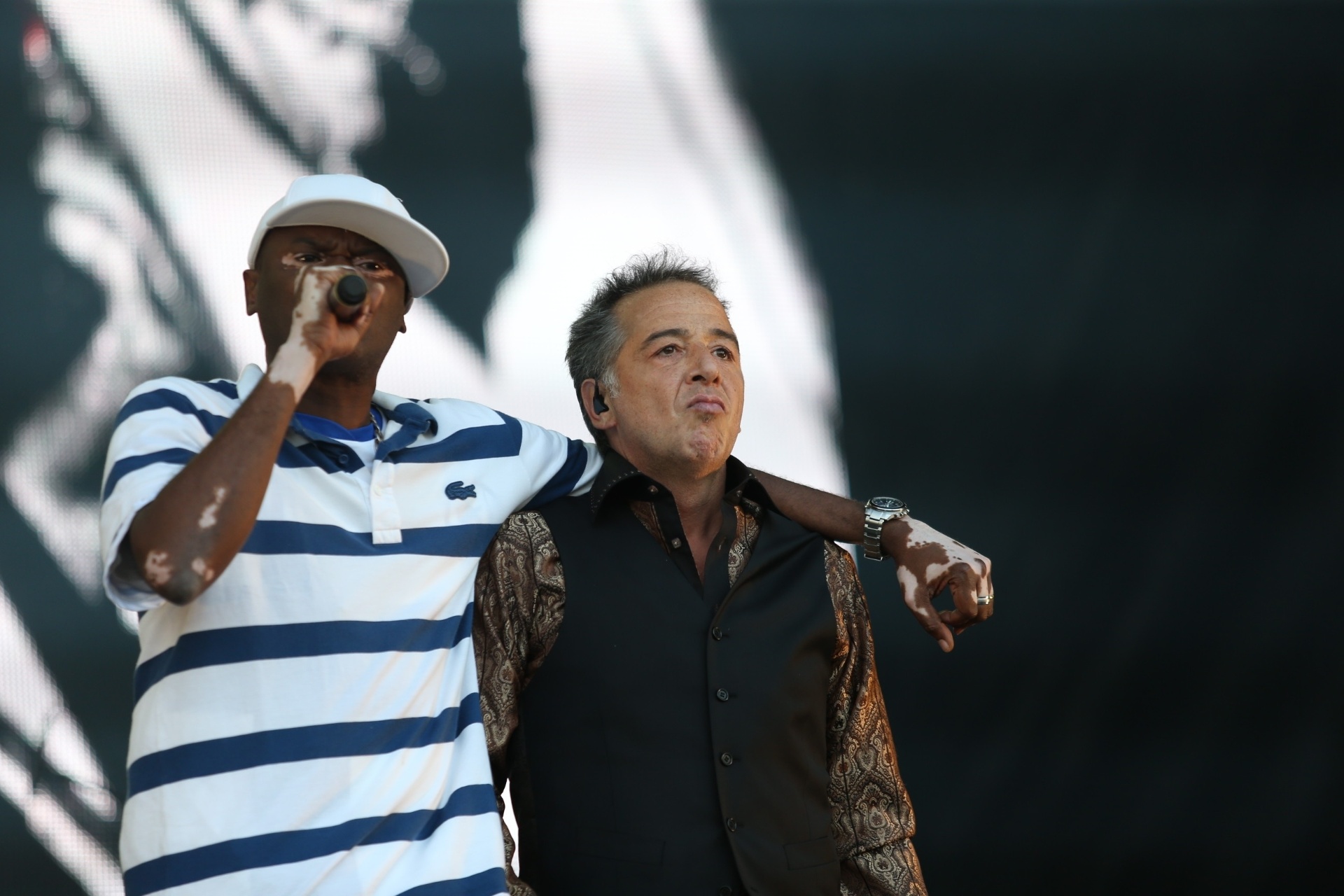 18.set.2015 - A banda Ira se apresenta ao lado de Rappin Hood e Tony Tornado no palco Sunset do Rock in Rio 2015. - Fábio Motta/Estadão Conteúdo