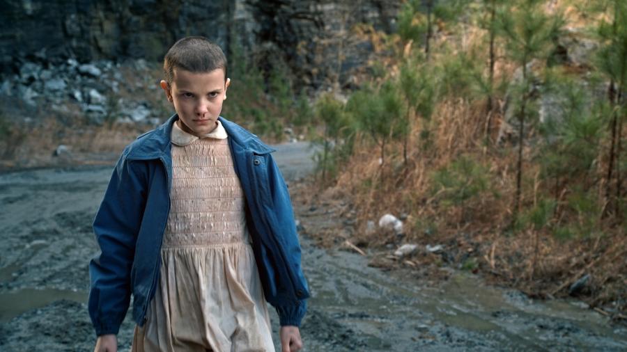 A atriz Millie Bobby Brown como Eleven em cena de "Stranger Things" - Reprodução