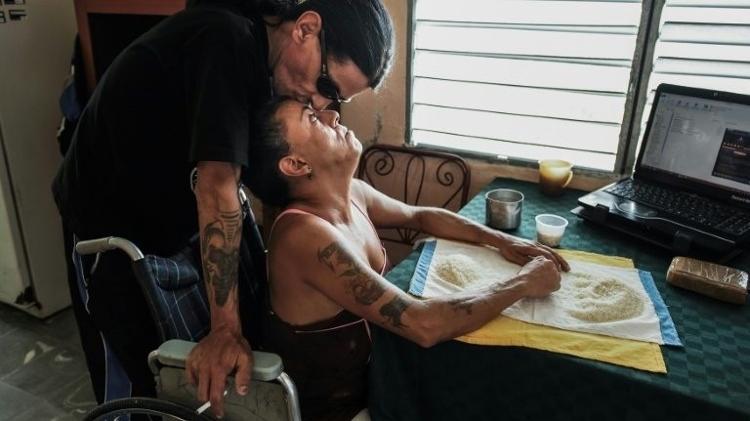 O casal Gerson Govea e Yohandra Cardoso - AFP - AFP