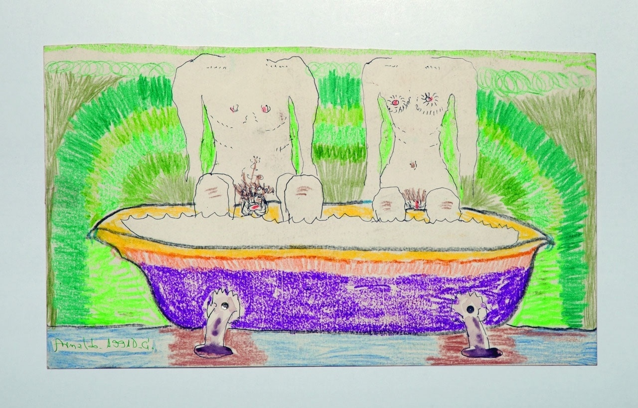 A exposição individual "Transmigração", de Arnaldo Dias Baptista, apresenta desenhos, pinturas, colagens e objetos pessoais como cadernos, jaquetas, camisetas e cartões-postais - Divulgação