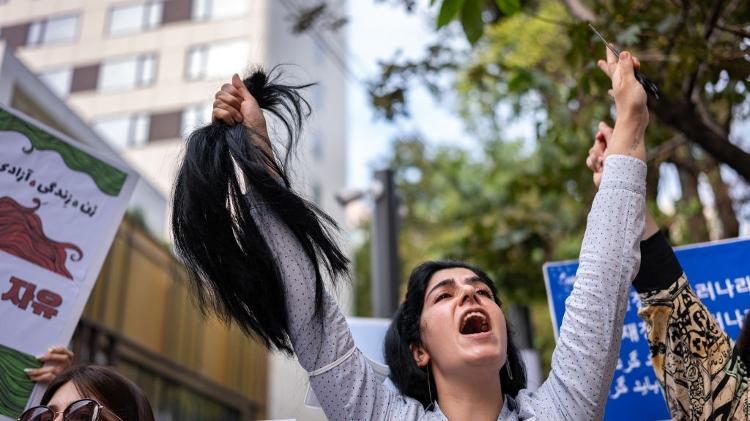 Cutting hair has also become a symbol of women's protests in Iran - Getty Images - Getty Images 