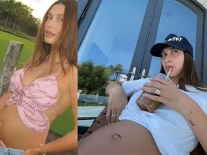 Hailey Bieber posa com barriguinha de grávida à mostra após anúncio