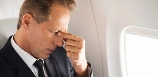 Problemas no avião, dor de cabeça, medo de voar - Getty Images - Getty Images