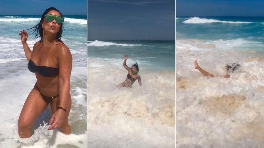 Viviane Araújo faz charme no mar, mas acaba levando tombo - Reprodução/Instagram