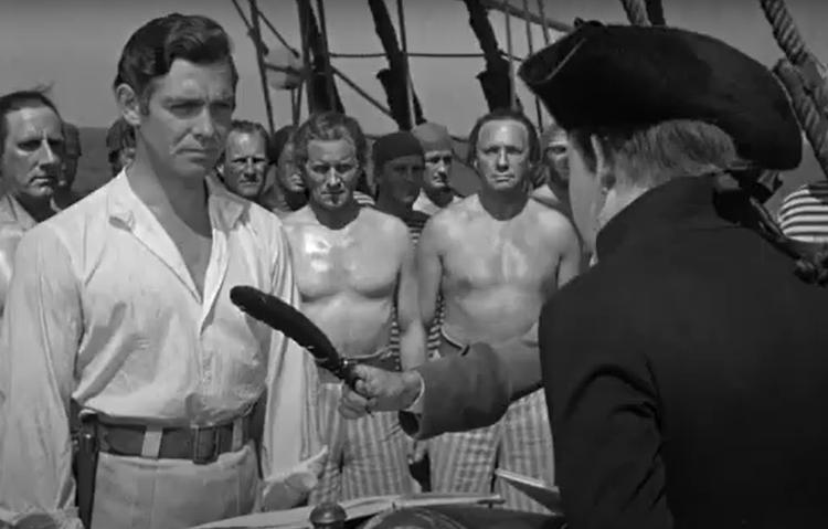 Clark Gable em cena de O Grande Motim (1935) Clark Gable em cena de O Grande Motim (1935)