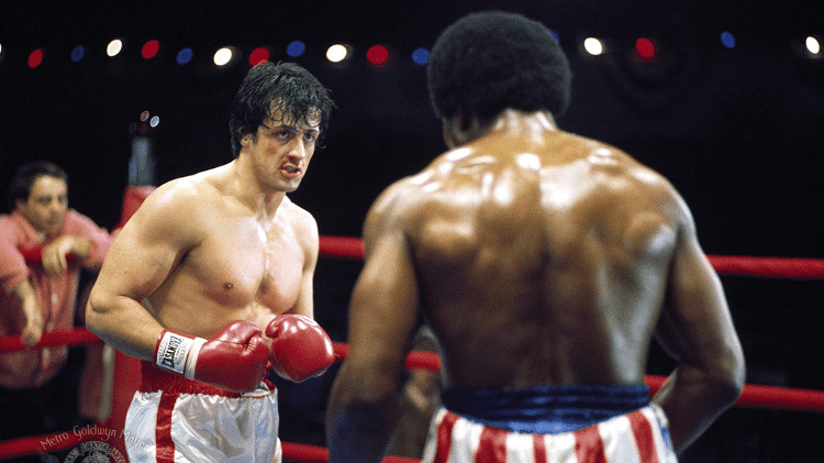 Sylvester Stallone em cena de "Rocky, um Lutador" (1976) Sylvester Stallone em cena de "Rocky, um Lutador" (1976)