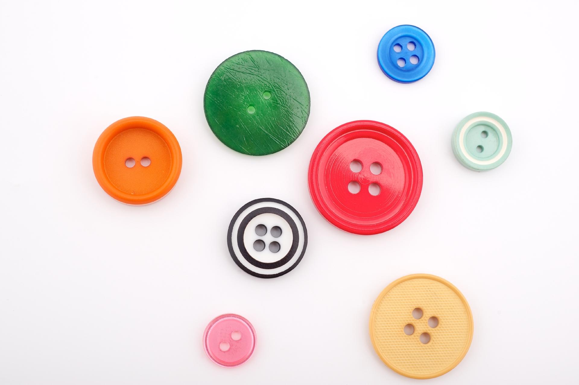 Tecido e botão extra - iStock