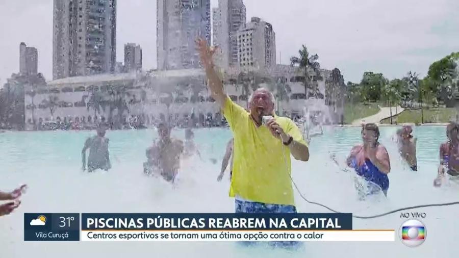 Márcio Canuto toma banho de piscina durante reportagem ao vivo do "SP1", telejornal local da Globo - Reprodução/TV Globo