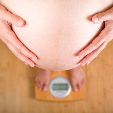 A balança é inimiga da gravidez? - Getty Images