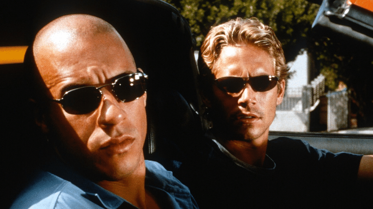 Vin Diesel e Paul Walker em cena de Velozes & Furiosos (2001)
