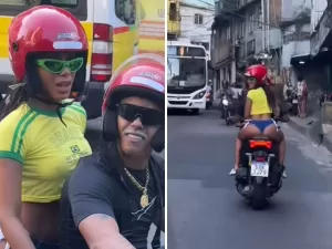 Anitta anda de moto de calcinha e camiseta do Brasil em favela do Rio