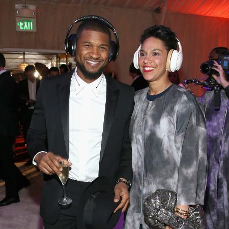 Usher e Grace Miguel - Getty Images
