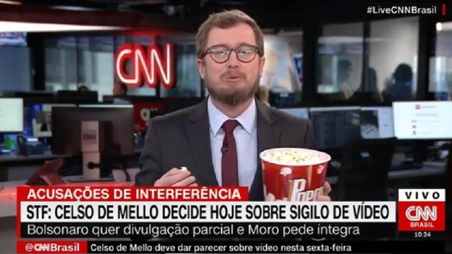 Leandro Narloch, da CNN, come pipoca no ar para ilustrar expectativa por divulgação de vídeo de reunião ministerial  - Reprodução/CNN