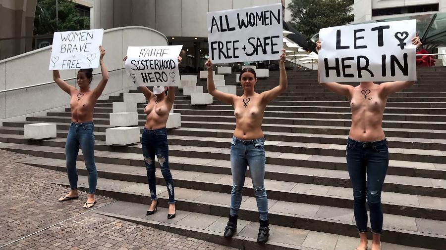 Mulheres de topless se manifestam na Austrália em apoio à jovem saudita - AFP