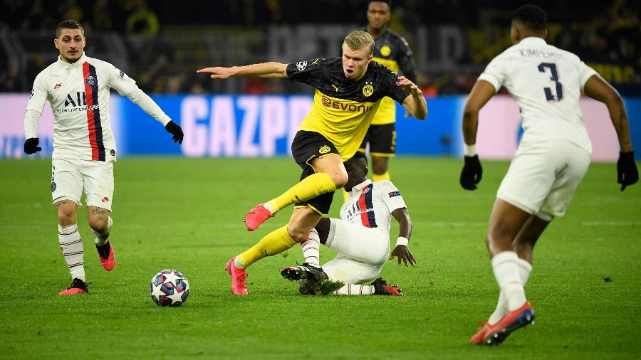 O atacante Erling Braut Haaland, que brilhou pelo Borussia Dortmund diante do PSG, na noite de terça-feira, pelas oitavas de final da Liga dos Campeões - Ina Fassbender / AFP