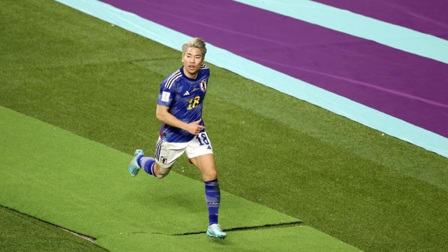 Takuma Asano, do Japão, comemora seu gol contra a Alemanha na Copa do Mundo - Robert Cianflone/Getty Images