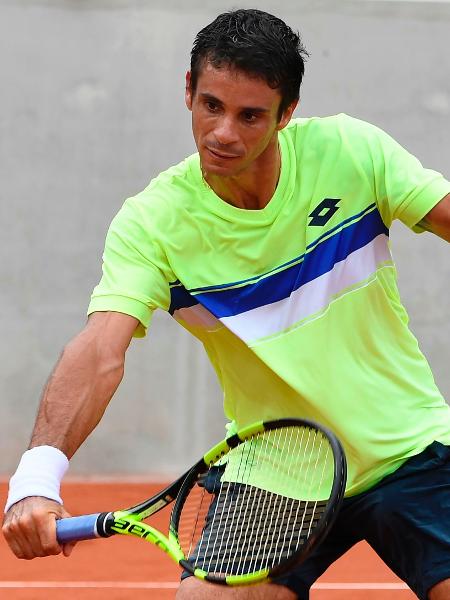 Rogerinho em ação contra Youzhny - Eric Feferberg/AFP - Eric Feferberg/AFP
