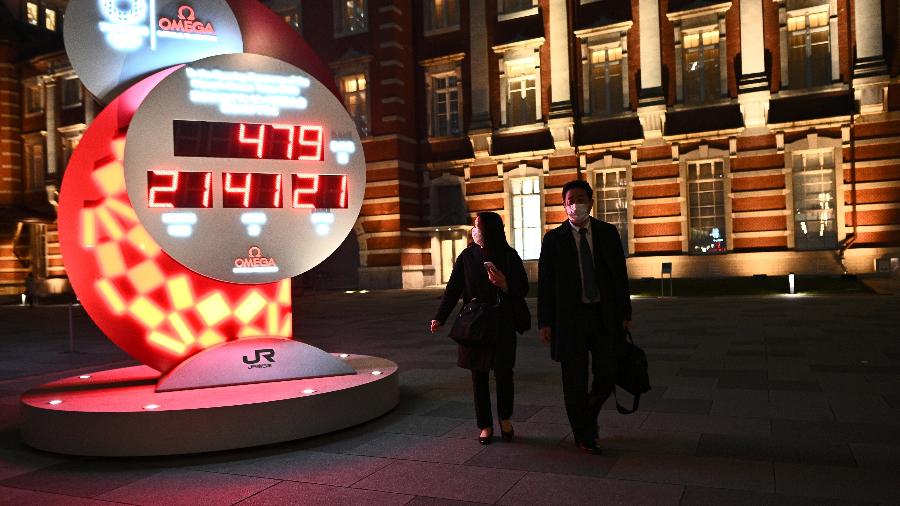 Agora, relógio no lado de fora da Estação de Tóquio marca 479 dias para o início dos Jogos - Philip Fong/AFP