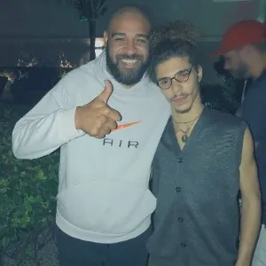 Adriano Imperador posa com o músico Danilo Minarini  - undefined