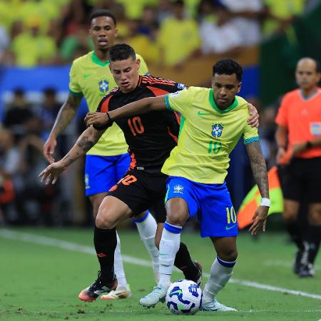 Rodrygo e James Rodríguez em ação durante jogo entre Brasil e Colômbia pelas Eliminatórias Rodrygo e James Rodríguez em ação durante jogo entre Brasil e Colômbia pelas Eliminatórias