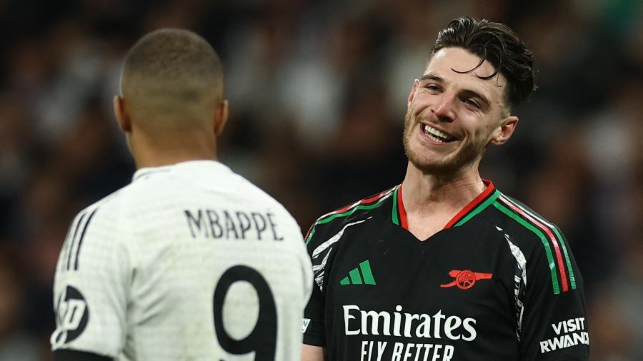 Declan Rice e Mbappé em ação durante jogo entre Real Madrid e Arsenal na Champions Declan Rice e Mbappé em ação durante jogo entre Real Madrid e Arsenal na Champions