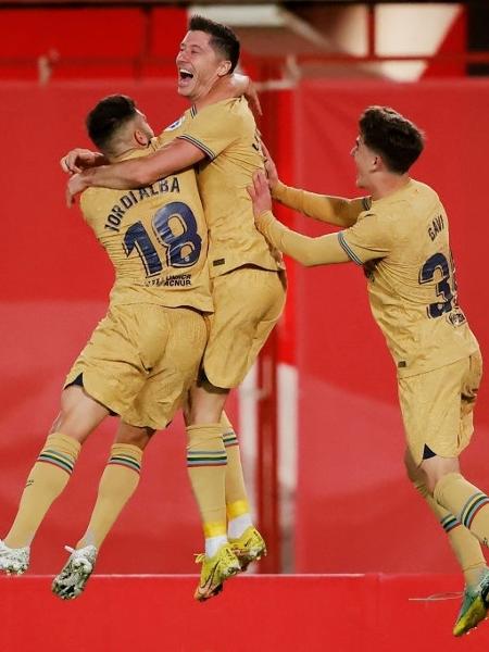 Jogadores do Barcelona comemoram gol sobre o Mallorca no Campeonato Espanhol - David S. Bustamante/Soccrates/Getty Images