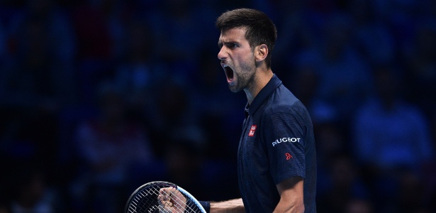 Djokovic comemora virada na partida do ATP Finals contra o austríaco Dominic Thiem -  AFP PHOTO / GLYN KIRK