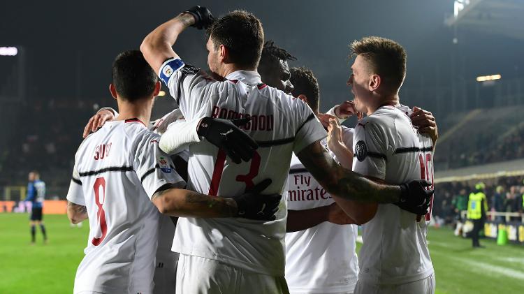Jogadores do Milan comemoram gol sobre a Atalanta - Miguel Medina/AFP - Miguel Medina/AFP