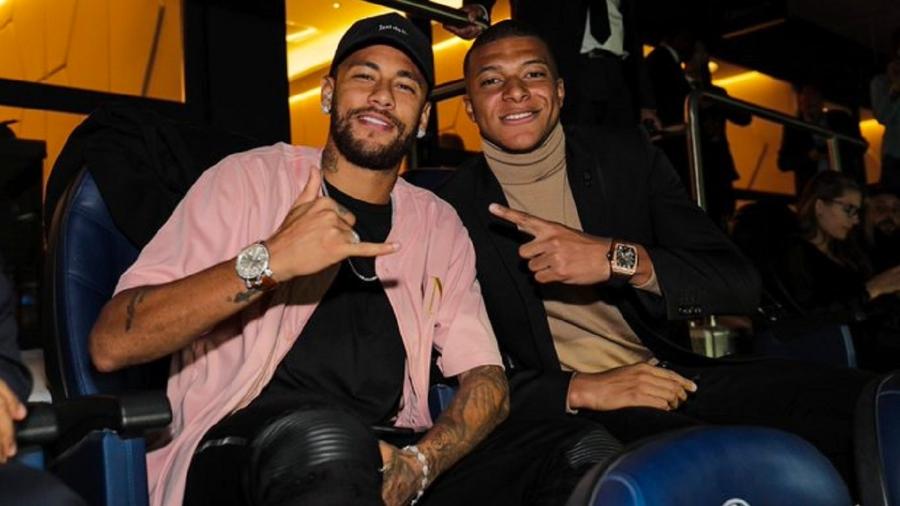 Neymar e Mbappé no camarote de uma partida do PSG contra o Real Madrid - Reprodução/Twitter