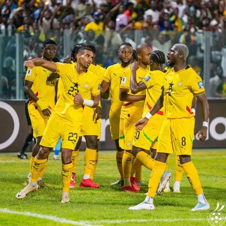 Jogadores de Gana comemoram classificação para a Copa do Mundo após vitória sobre Comores Jogadores de Gana comemoram classificação para a Copa do Mundo após vitória sobre Comores