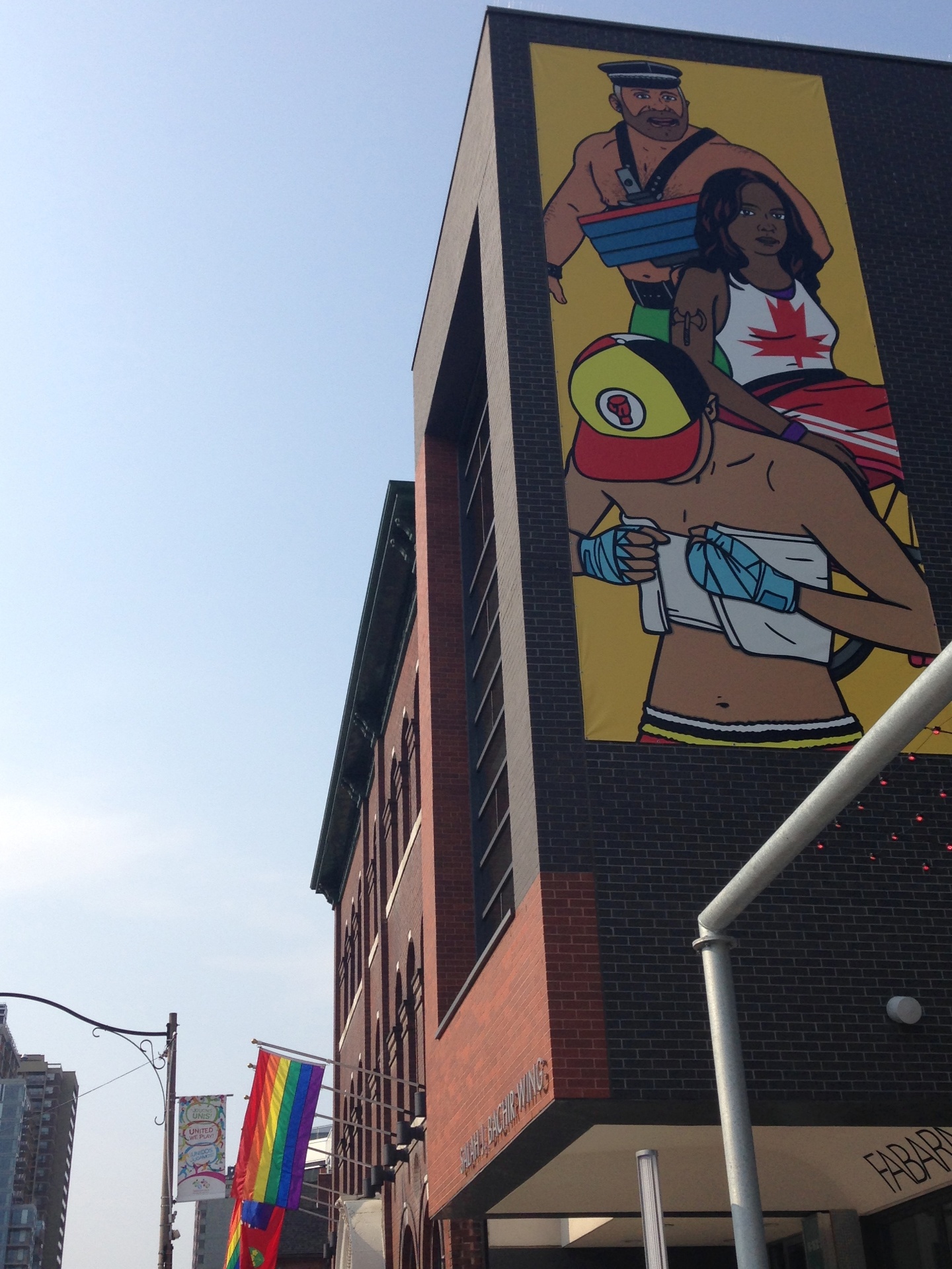 Pride House, casa organizada pelos gays para celebrar o Pan, tem imagens do lado de fora com desenho de atletas com trajes típicos LGBT