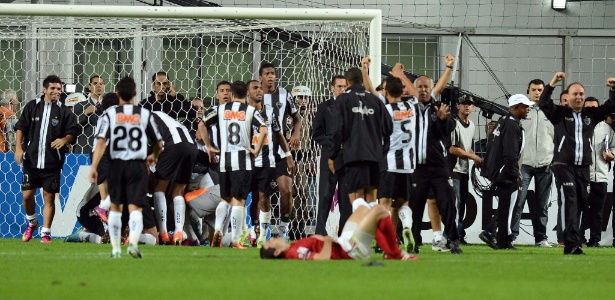 Jogadores do Atlético-MG comemoram classificação dramática contra o Tijuana - AFP PHOTO / Evaristo SA 