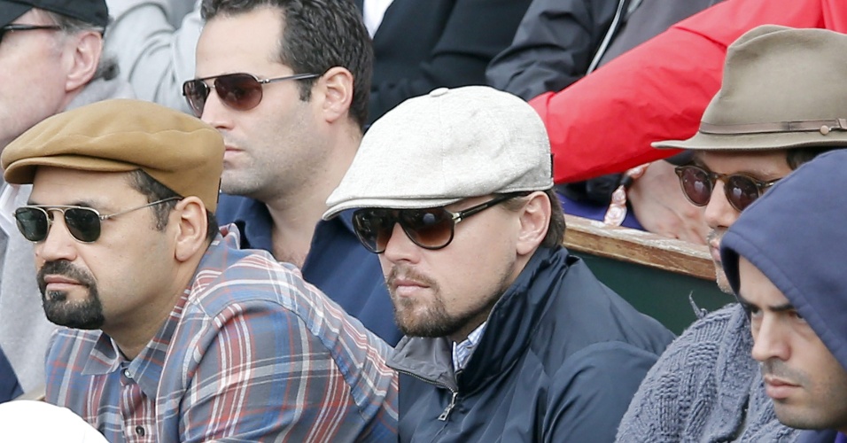 Leonardo DiCaprio acompanha a partida entre Roger Federer e Giles Simon