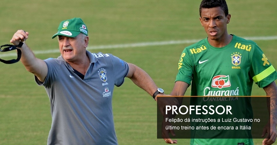 PROFESSOR Felipão dá instruções a Luiz Gustavo no último treino antes de encara a Itália