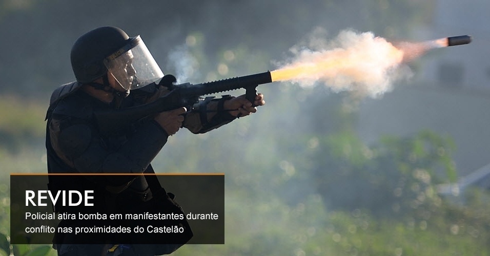 REVIDE - Policial atira bomba em manifestantes durante conflito nas proximidades do Castelão