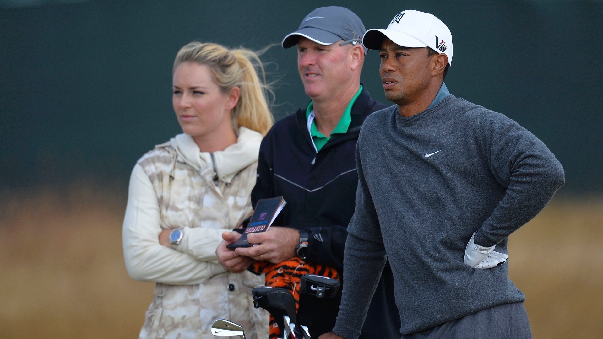 15.jul.2013 - Lindsey Vonn, esquiadora e namorada de Tiger Woods (d), acompanha um treino do golfista preparatório para o Aberto do Reino Unido na Escócia - REUTERS/Russell Cheyne