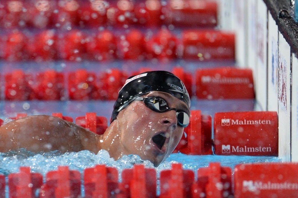 1.ago.2013 - Ryan Lochte bate em primeiro e leva o ouro nos 200 m medley em Barcelona - AFP PHOTO / FRANCOIS XAVIER MARIT